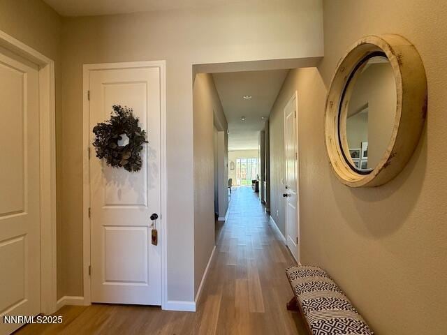 7800 Hoback Dr, Sparks, NV 89436 - hall featuring wood finished floors, baseboards, and recessed lighting