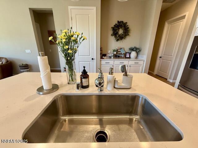 7800 Hoback Dr, Sparks, NV 89436 - kitchen view of light countertops and white cabinetry