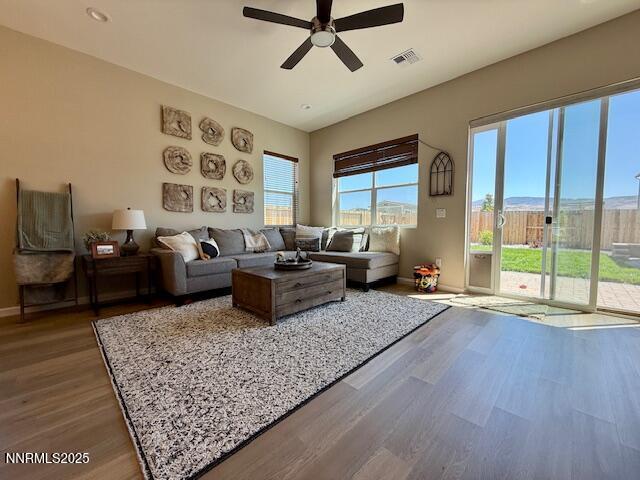 7800 Hoback Dr, Sparks, NV 89436 - living room with ceiling fan, wood finished floors, and baseboards