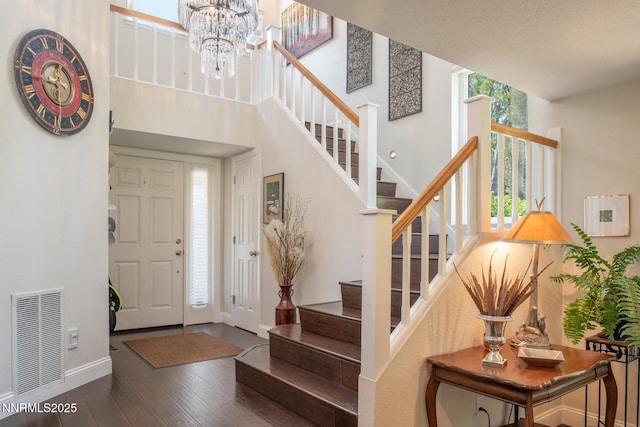 2061 Mountain Vista Way, Reno, NV 89519 - entryway with plenty of natural light, wood finished floors, stairway, and a chandelier