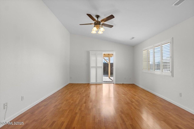 51 Badger Creek Ct, Sparks, NV 89436 - unfurnished room featuring vaulted ceiling, healthy amount of natural light, ceiling fan, and light wood-style flooring