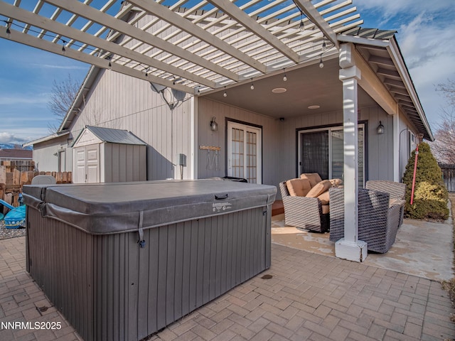 733 Bowles Ln, Gardnerville, NV 89460 - view of patio featuring a hot tub, an outdoor hangout area, and a pergola