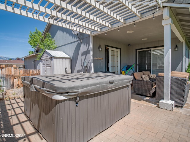 733 Bowles Ln, Gardnerville, NV 89460 - view of patio featuring a hot tub, a pergola, and outdoor lounge area