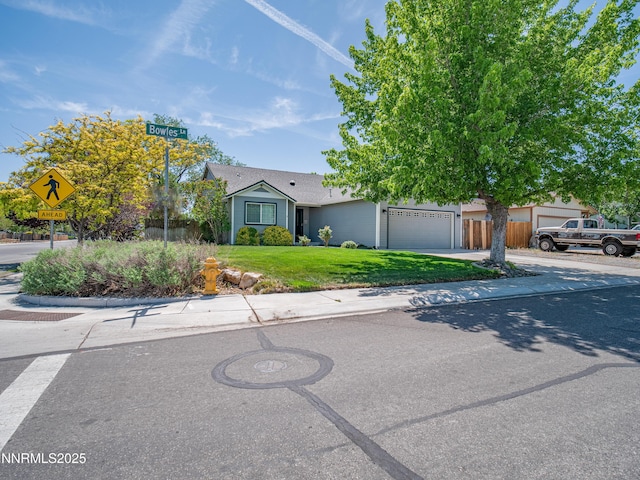 733 Bowles Ln, Gardnerville, NV 89460 - view of front of property featuring a garage and driveway