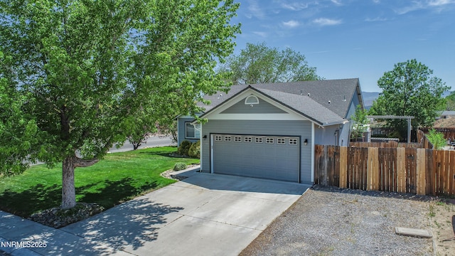 733 Bowles Ln, Gardnerville, NV 89460 - ranch-style house with concrete driveway, an attached garage, and a shingled roof