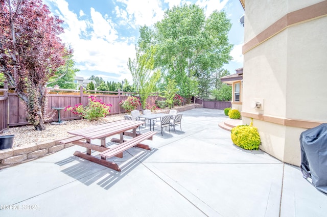 6752 Eagle Wing Cir, Sparks, NV 89436 - fenced backyard featuring outdoor dining area and a patio