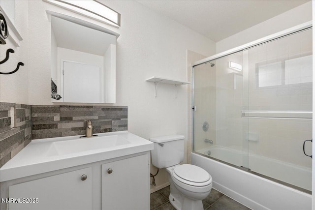 3830 Avocet Ct, Reno, NV 89508 - bathroom featuring vanity, tasteful backsplash, combined bath / shower with glass door, and tile patterned floors