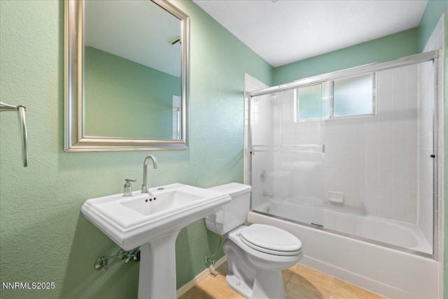 3830 Avocet Ct, Reno, NV 89508 - full bath featuring a textured wall and bath / shower combo with glass door