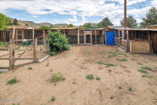 3830 Avocet Ct, Reno, NV 89508 - view of yard with an outbuilding and a mountain view