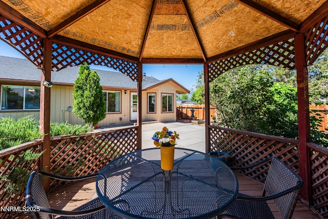 804 Bluerock Rd, Gardnerville, NV 89460 - deck featuring a gazebo, outdoor dining space, and a patio