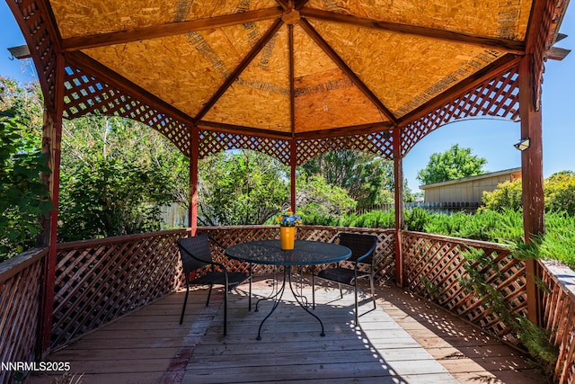804 Bluerock Rd, Gardnerville, NV 89460 - wooden deck featuring a gazebo and outdoor dining space