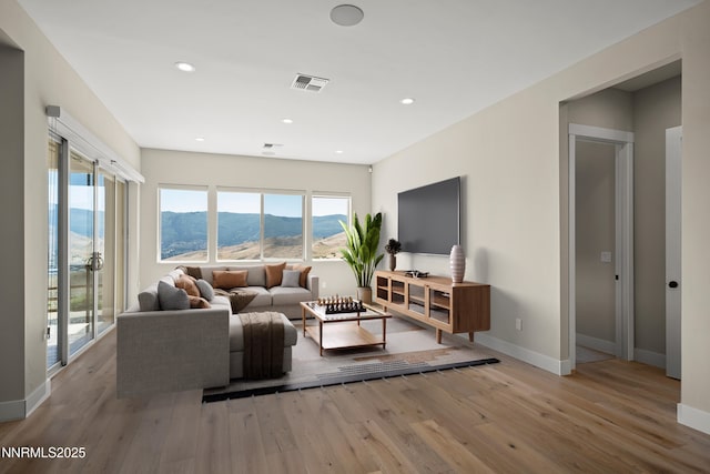 2241 Cold Creek Trl, Reno, NV 89523 - living area with light wood finished floors and recessed lighting