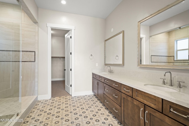 2241 Cold Creek Trl, Reno, NV 89523 - bathroom with double vanity, a tile shower, and a spacious closet