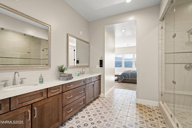 2241 Cold Creek Trl, Reno, NV 89523 - ensuite bathroom with double vanity, a stall shower, and recessed lighting