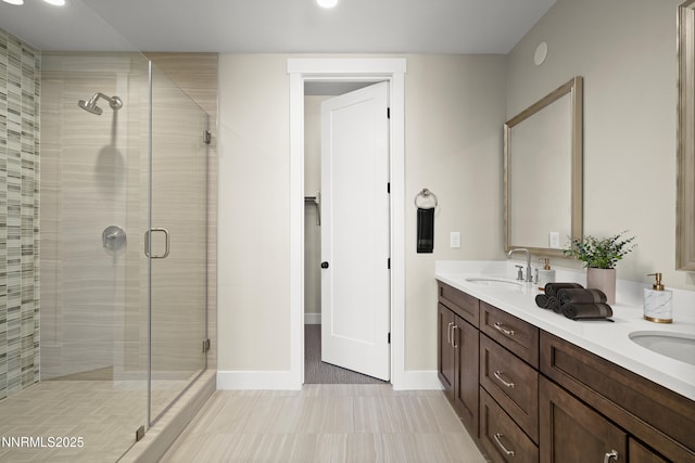 2241 Cold Creek Trl, Reno, NV 89523 - full bathroom featuring a shower stall, double vanity, recessed lighting, and tile patterned flooring