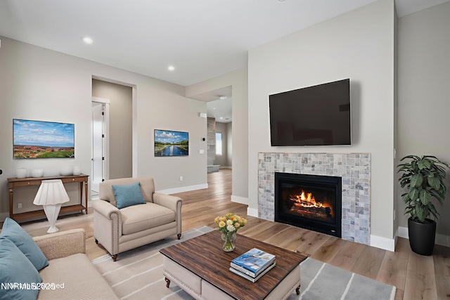 2241 Cold Creek Trl, Reno, NV 89523 - living room featuring light wood-style flooring, a fireplace, and recessed lighting
