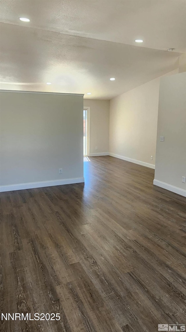 5910 Poinsettia Ct, Sun Valley, NV 89433 - spare room with dark wood-type flooring, baseboards, and recessed lighting