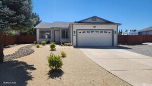 5910 Poinsettia Ct, Sun Valley, NV 89433 - ranch-style home featuring concrete driveway and a garage