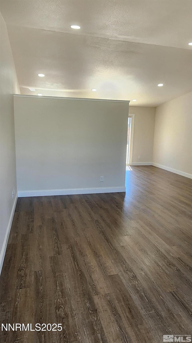 5910 Poinsettia Ct, Sun Valley, NV 89433 - spare room featuring dark wood-style floors, recessed lighting, and baseboards
