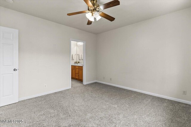 7250 Timber Ridge Ct, Reno, NV 89523 - unfurnished bedroom with light carpet, ensuite bathroom, and ceiling fan