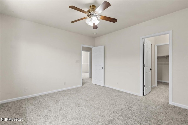 7250 Timber Ridge Ct, Reno, NV 89523 - unfurnished bedroom with light carpet, a walk in closet, a ceiling fan, and a closet