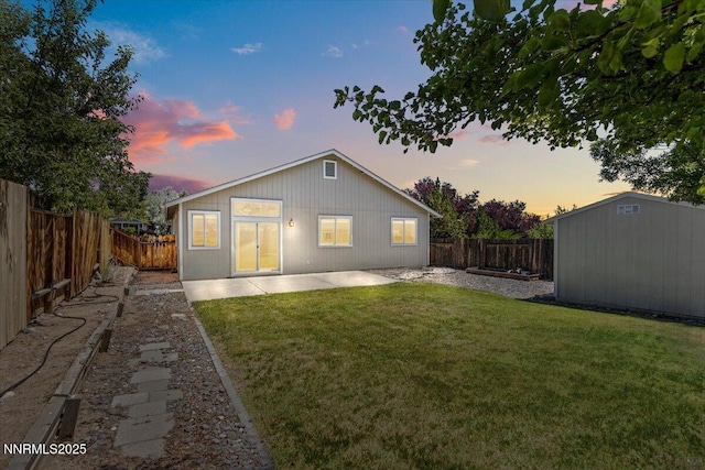 7250 Timber Ridge Ct, Reno, NV 89523 - back of property with a patio, a fenced backyard, and a storage shed