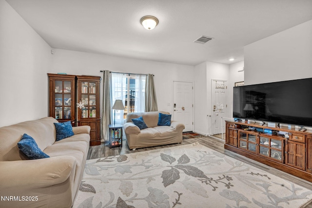 529 Autumn Breeze Cir, Reno, NV 89511 - living area featuring wood finished floors and recessed lighting