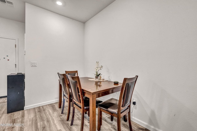 529 Autumn Breeze Cir, Reno, NV 89511 - dining space with light wood-style flooring and baseboards