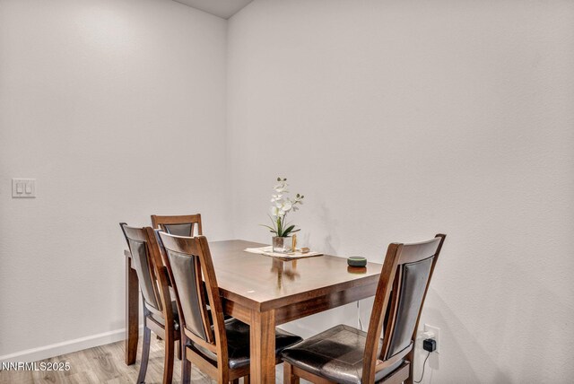 529 Autumn Breeze Cir, Reno, NV 89511 - dining room with baseboards and light wood-style floors