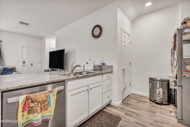 529 Autumn Breeze Cir, Reno, NV 89511 - kitchen with a sink, appliances with stainless steel finishes, light stone counters, light wood-style floors, and recessed lighting