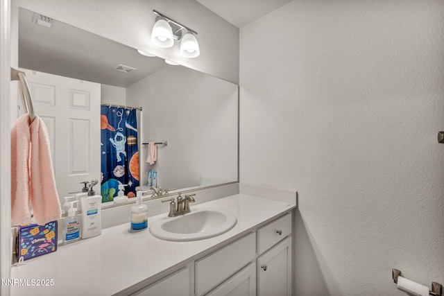 529 Autumn Breeze Cir, Reno, NV 89511 - bathroom with vanity and a textured wall
