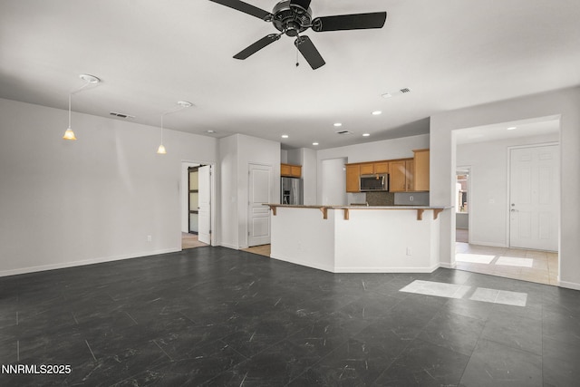 9195 Summertree Ct, Reno, NV 89523 - unfurnished living room featuring ceiling fan and recessed lighting