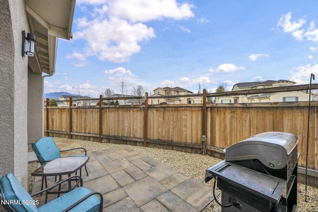 1248 Cinch Trl Unit 3, Gardnerville, NV 89410 - fenced backyard featuring a grill and a patio area