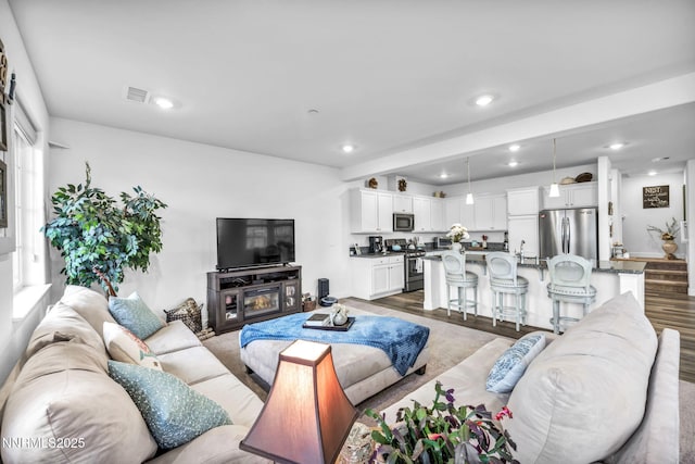 1248 Cinch Trl Unit 3, Gardnerville, NV 89410 - living area featuring dark wood-style flooring and recessed lighting
