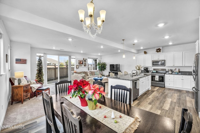 1248 Cinch Trl Unit 3, Gardnerville, NV 89410 - dining room featuring a chandelier, light wood finished floors, and recessed lighting
