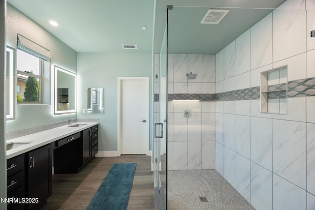 4697 High Pass Ct, Sparks, NV 89436 - full bathroom with a shower stall, double vanity, wood finished floors, recessed lighting, and baseboards