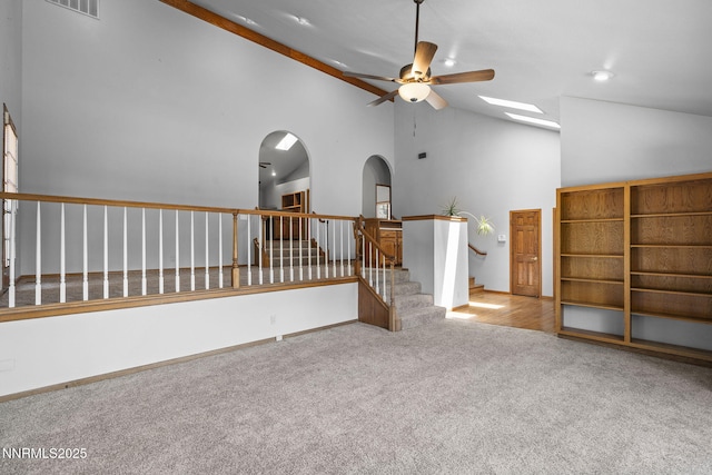 430 E Queen Way, Sparks, NV 89431 - empty room with a ceiling fan, carpet, high vaulted ceiling, stairs, and arched walkways