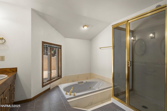 430 E Queen Way, Sparks, NV 89431 - full bathroom with lofted ceiling, vanity, a tub with jets, a shower stall, and tile patterned floors