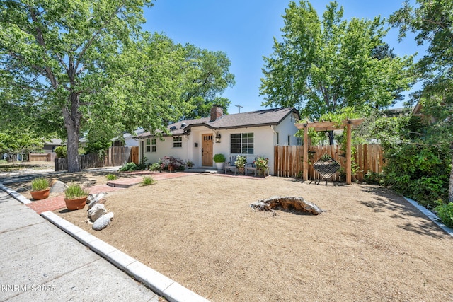 705 Elm St, Carson City, NV 89703 - single story home with a chimney and stucco siding