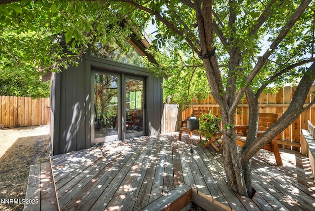 705 Elm St, Carson City, NV 89703 - wooden terrace featuring a fenced backyard