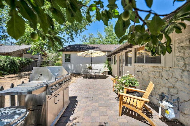 705 Elm St, Carson City, NV 89703 - view of patio / terrace featuring area for grilling and outdoor dining area