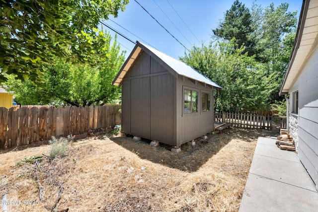705 Elm St, Carson City, NV 89703 - view of shed featuring a fenced backyard