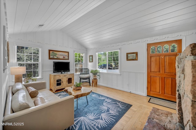 705 Elm St, Carson City, NV 89703 - living area with wood-type flooring, wooden ceiling, lofted ceiling, and wainscoting