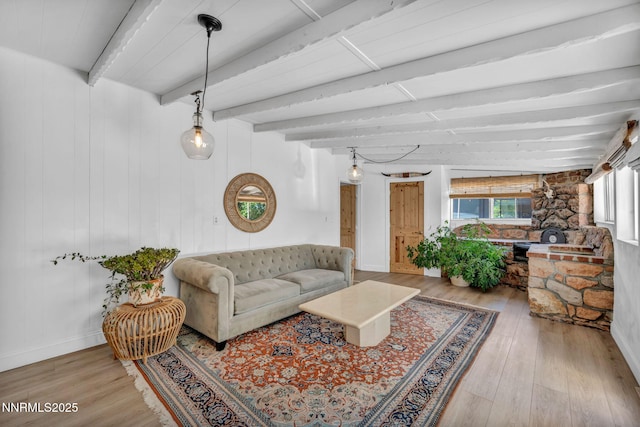 705 Elm St, Carson City, NV 89703 - living area with wood finished floors and beamed ceiling
