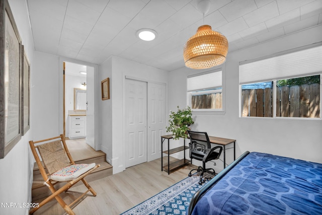705 Elm St, Carson City, NV 89703 - bedroom featuring wood finished floors and a closet