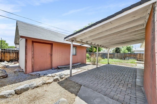 3310 Delna Dr, Sparks, NV 89431 - fenced backyard featuring a patio area and an outdoor structure