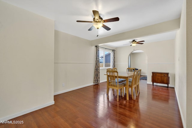 3310 Delna Dr, Sparks, NV 89431 - dining room featuring wood finished floors, a ceiling fan, and arched walkways