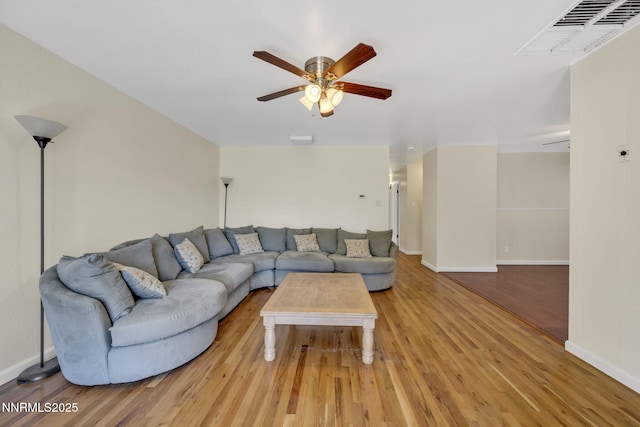 3310 Delna Dr, Sparks, NV 89431 - living room with light wood-style floors and a ceiling fan
