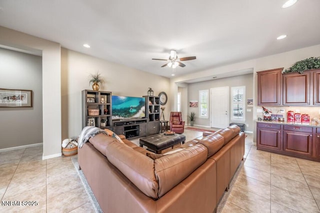 9800 Hafflinger Ln, Reno, NV 89521 - living area with a ceiling fan, light tile patterned floors, recessed lighting, and baseboards