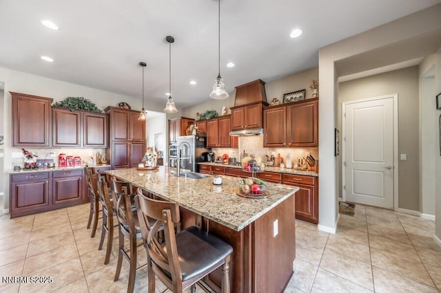9800 Hafflinger Ln, Reno, NV 89521 - kitchen with a sink, light tile patterned floors, decorative backsplash, and recessed lighting